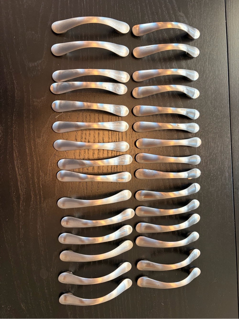 Pack of 28 Silver Cabinet Drawer Pulls - Sleek Curved Design